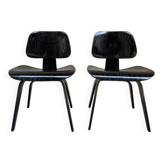 Pair of DCW chairs by Charles & Ray Eames in Black for Herman Miller 1950