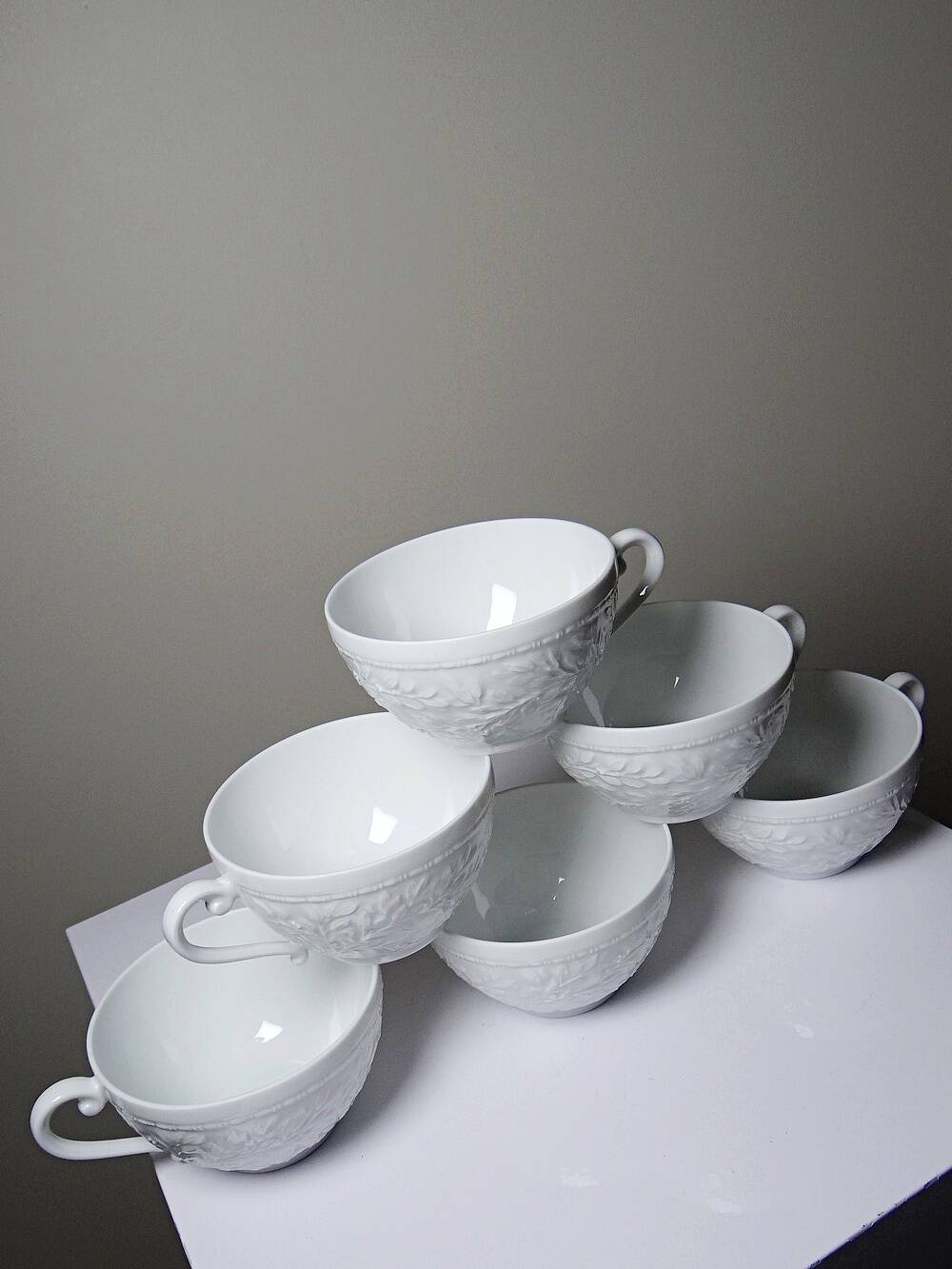 Set of 6 Bernardaud Limoges Louvre model white porcelain cups.