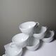 Set of 6 Bernardaud Limoges Louvre model white porcelain cups.
