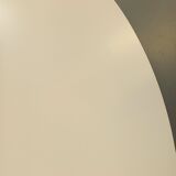 Vintage Eames round table for Vitra in white melamine, wood, and metal.