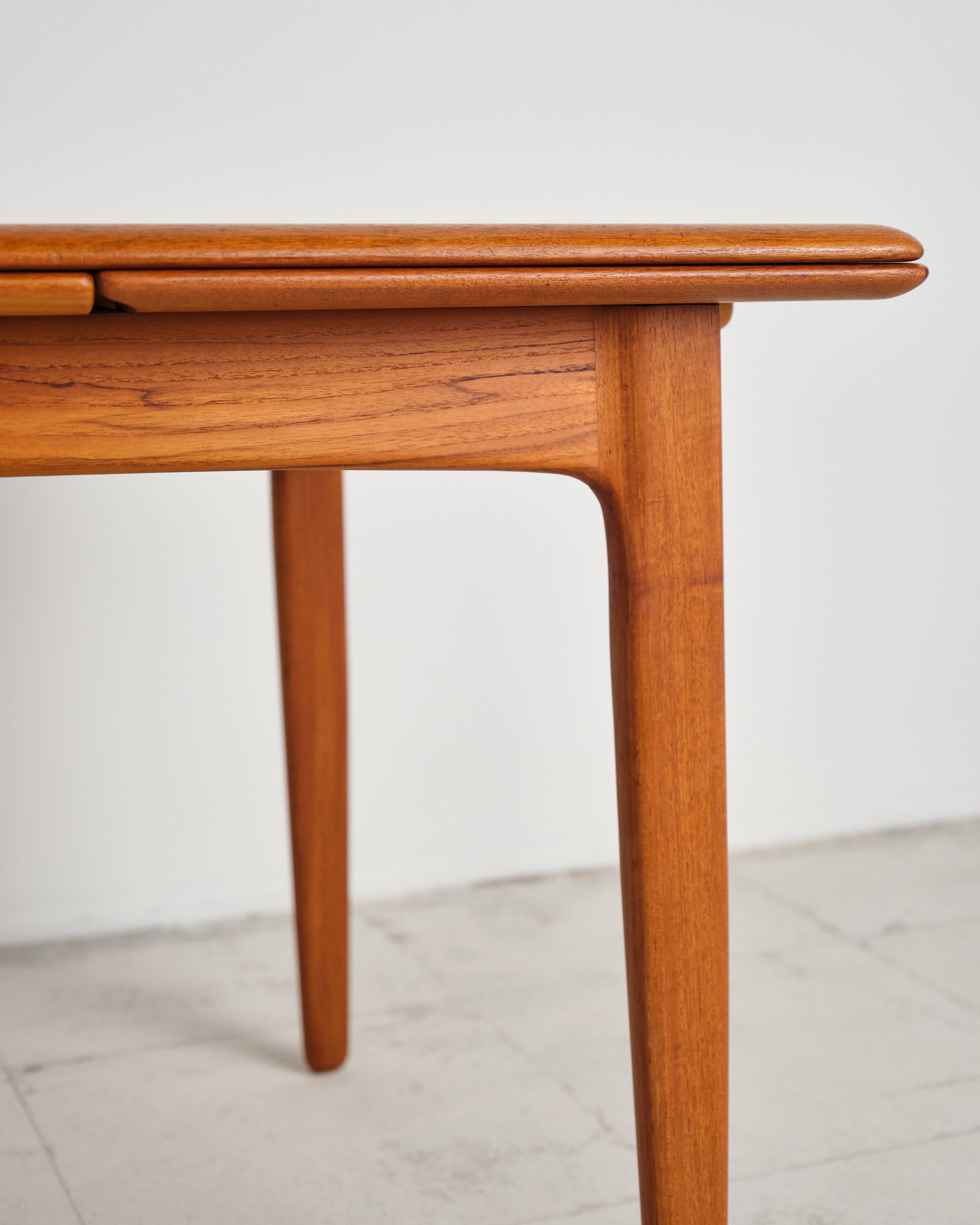 Extendable table by Svend Aage Madsen for K. Knudsen & Son