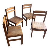 Set of four rustic solid wood dining chairs, Europe, circa 1970s.