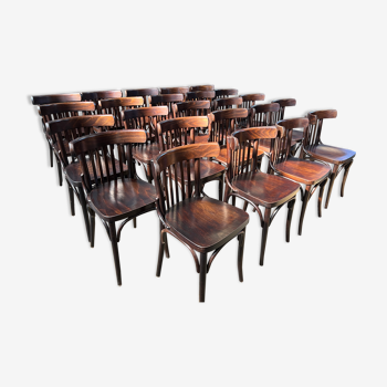 Set of 24 restored bistro chairs.