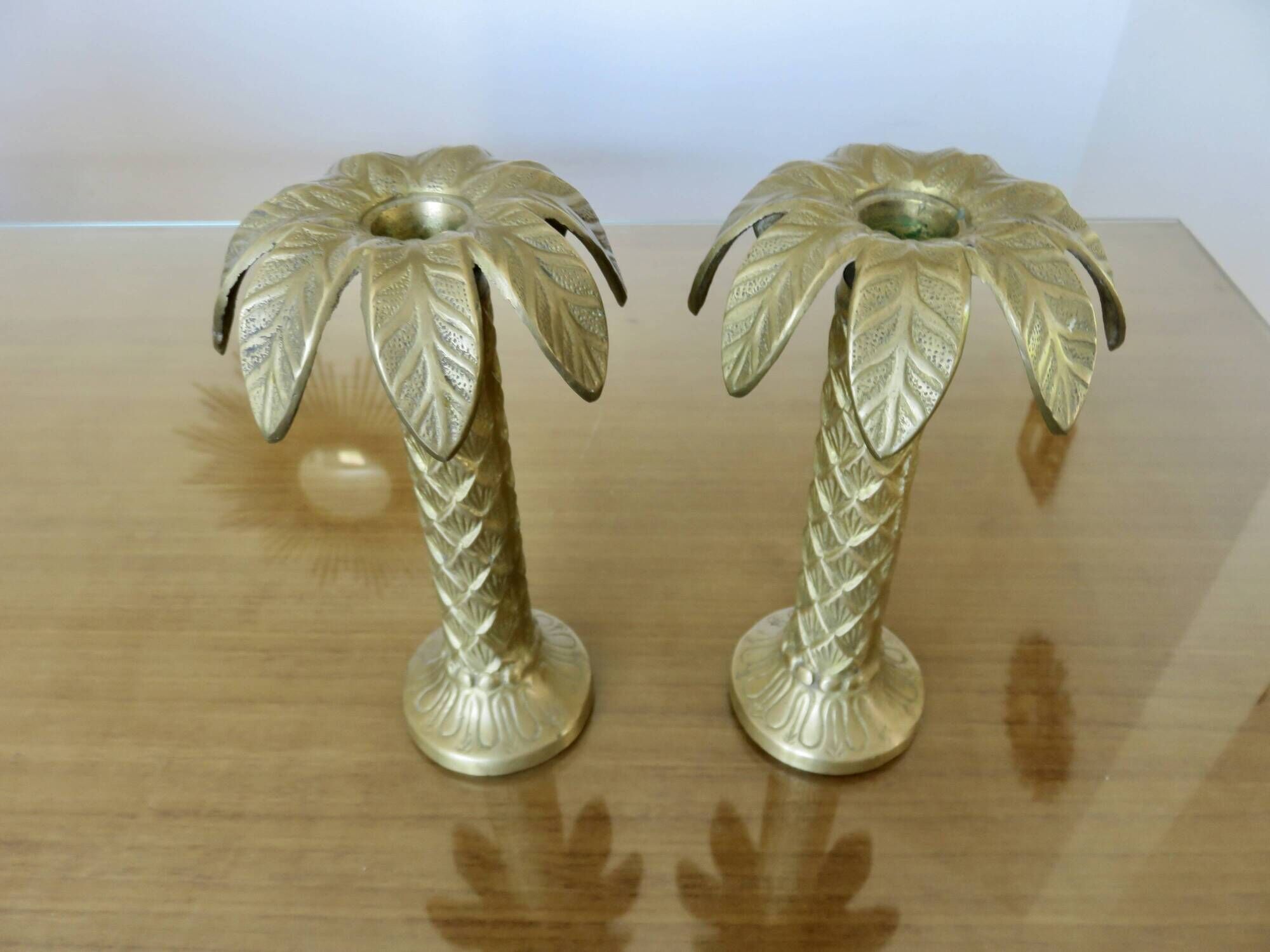 Pair of "palm tree" candlesticks in solid gilded brass, 1970