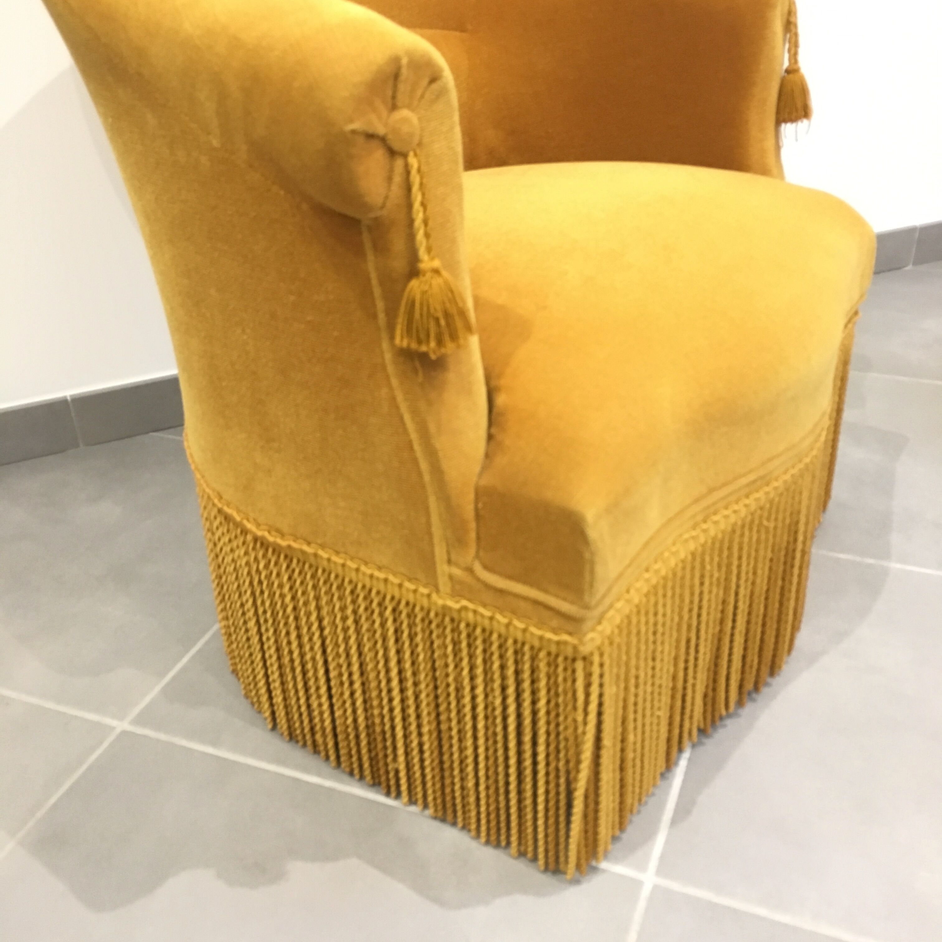 Pair of velvet fringed low chairs