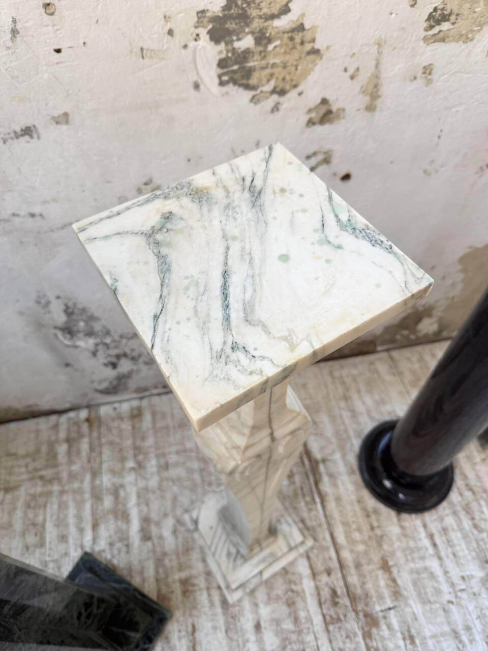 Set of 4 marble columns or pedestals.
