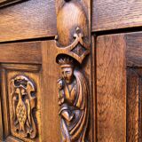 Spanish furniture with carved wood profiles and coats of arms from the 1950s.