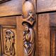 Spanish furniture with carved wood profiles and coats of arms from the 1950s.