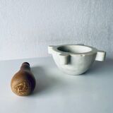 Old marble mortar with wooden pestle