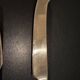 Golden metal cheese cutlery imitating bamboo