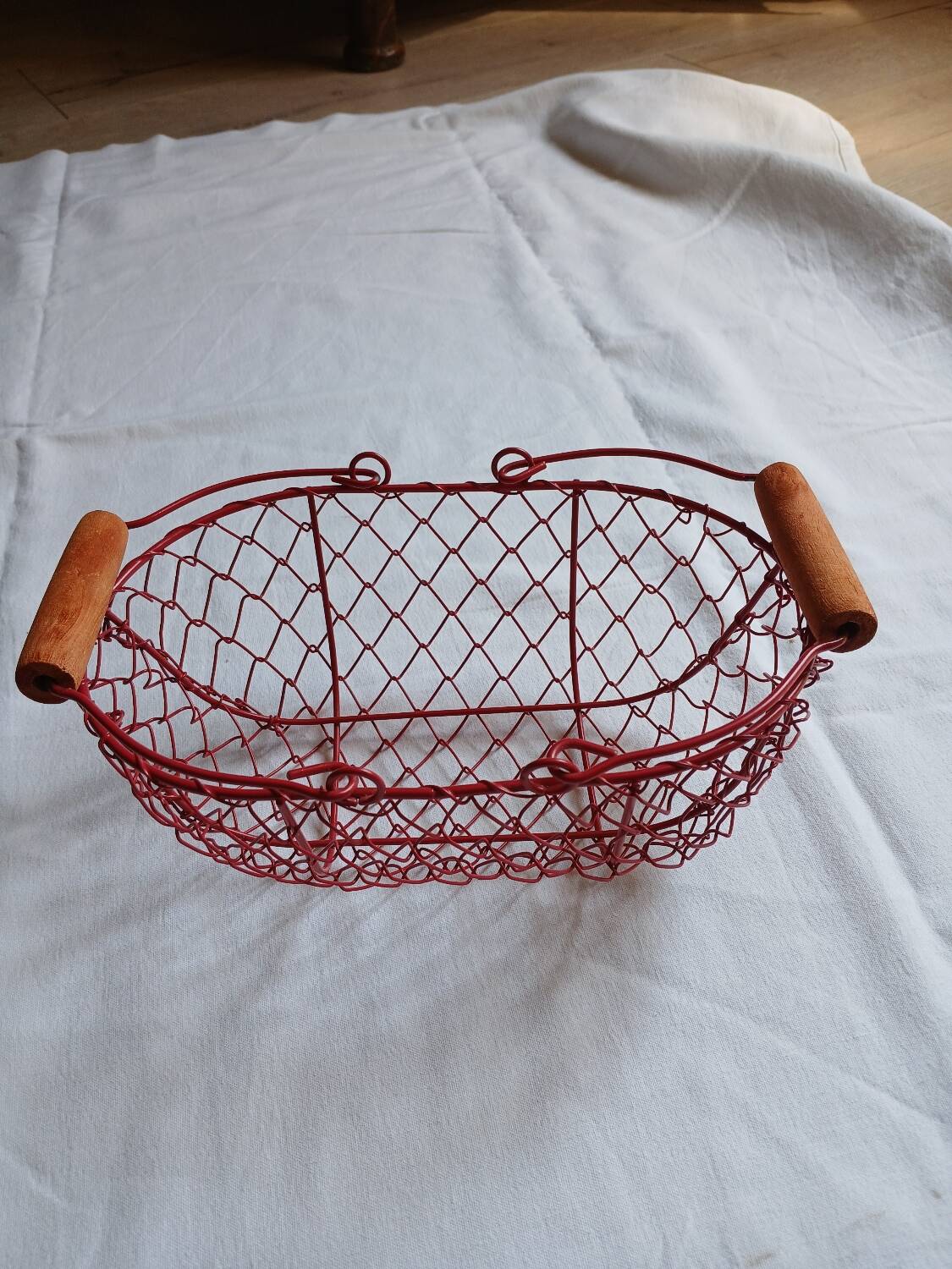 Small red metal basket