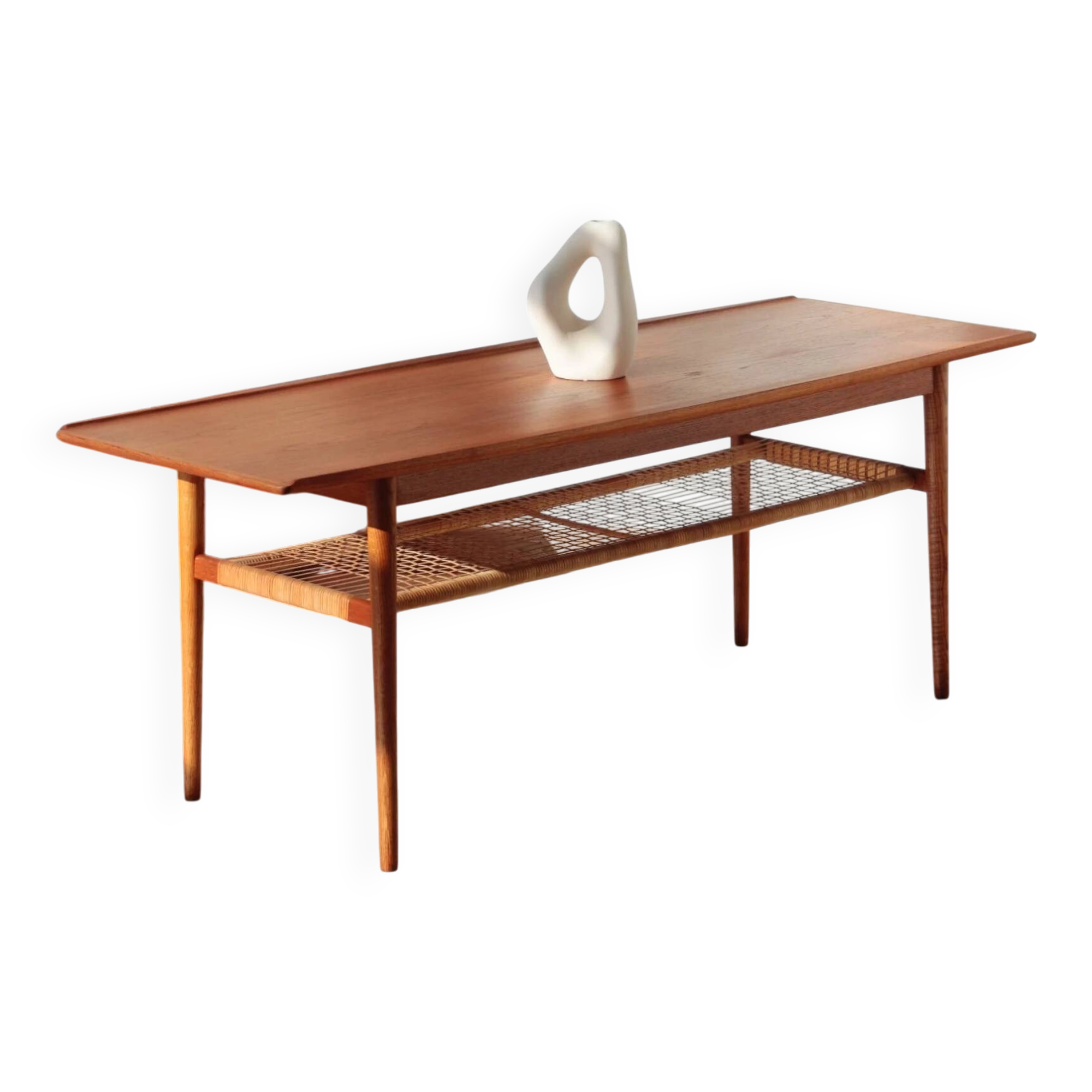 Vintage Scandinavian coffee table in teak and rattan – Danish design from the 1960s.