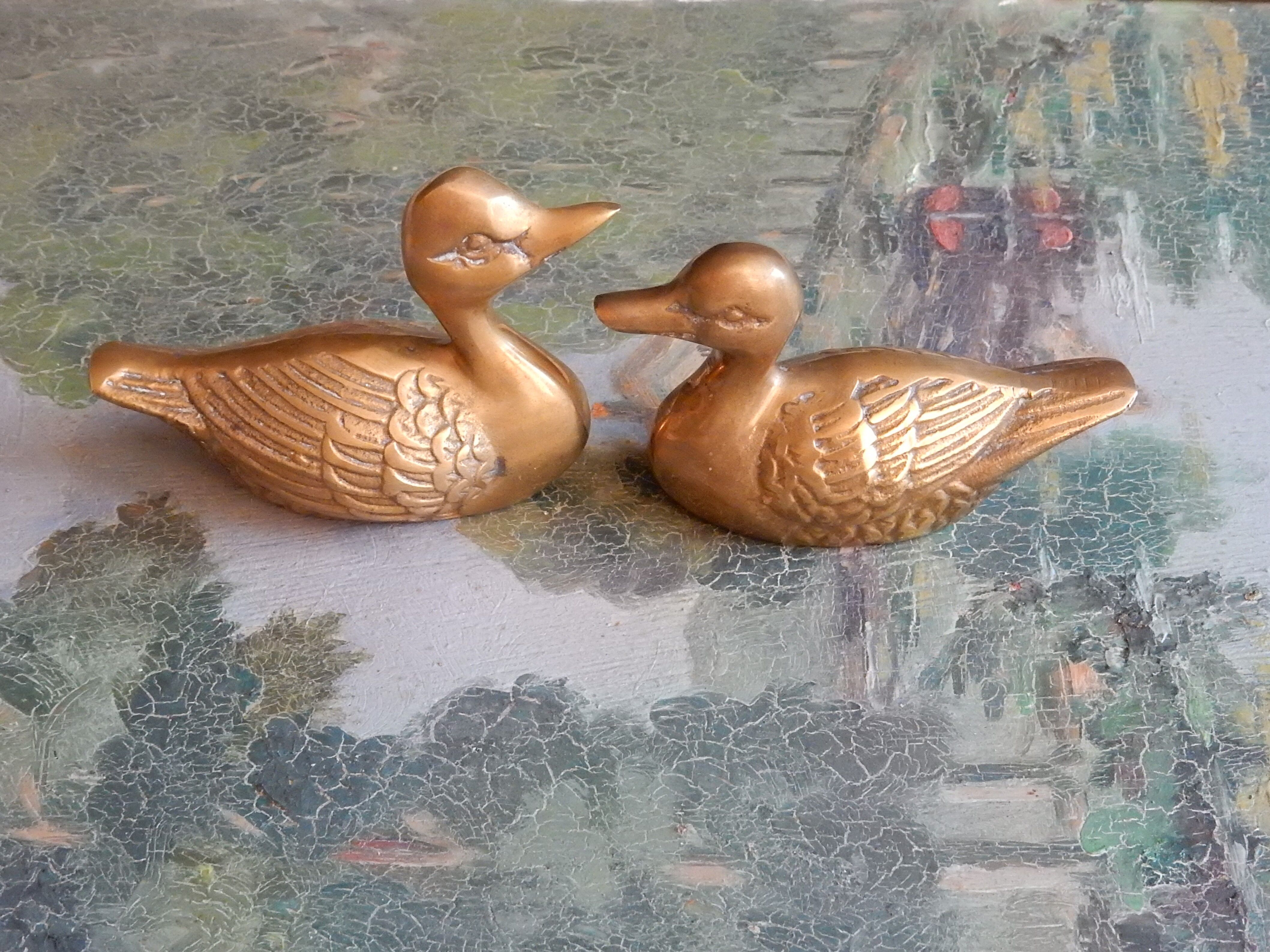 Couple of brass ducks