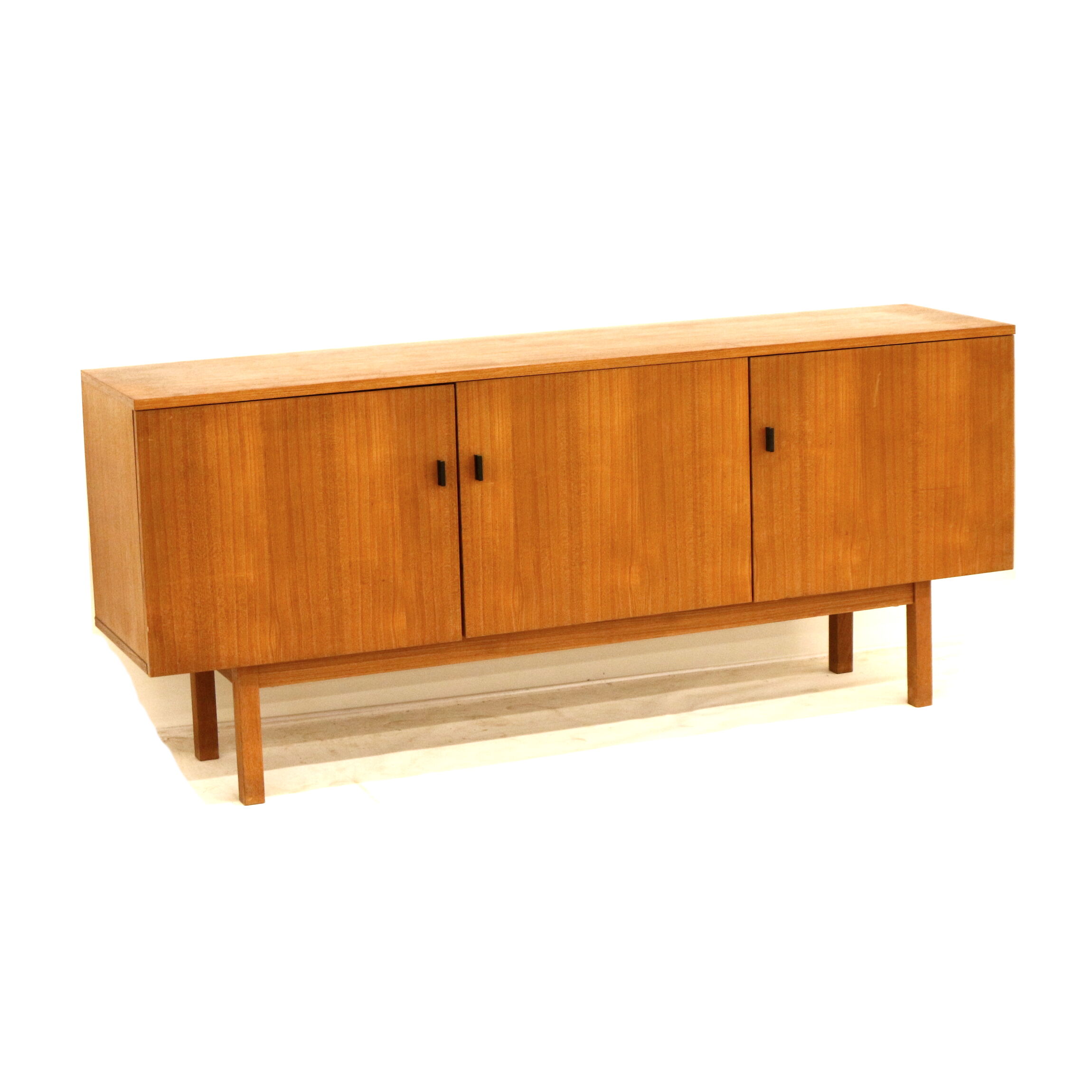 Vintage teak sideboard with doors and drawer made in the 1960s
