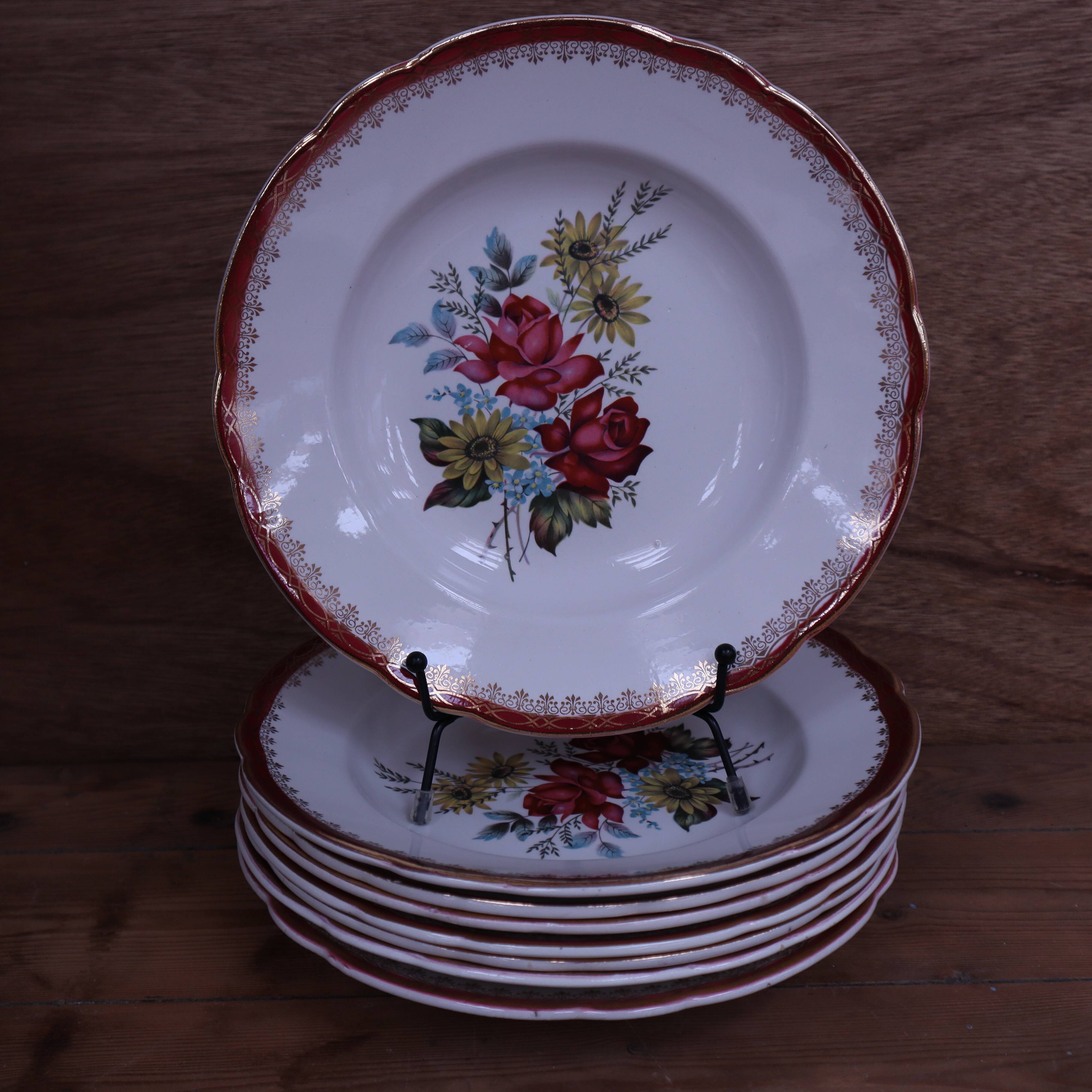 8 deep plates in half porcelain signed FB Floral decoration
