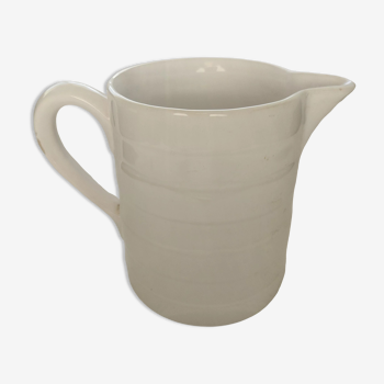 Old white ceramic pitcher