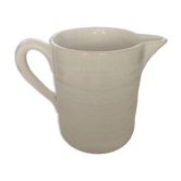 Antique white ceramic pitcher