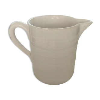 Antique white ceramic pitcher