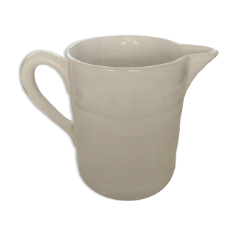 Old white ceramic pitcher