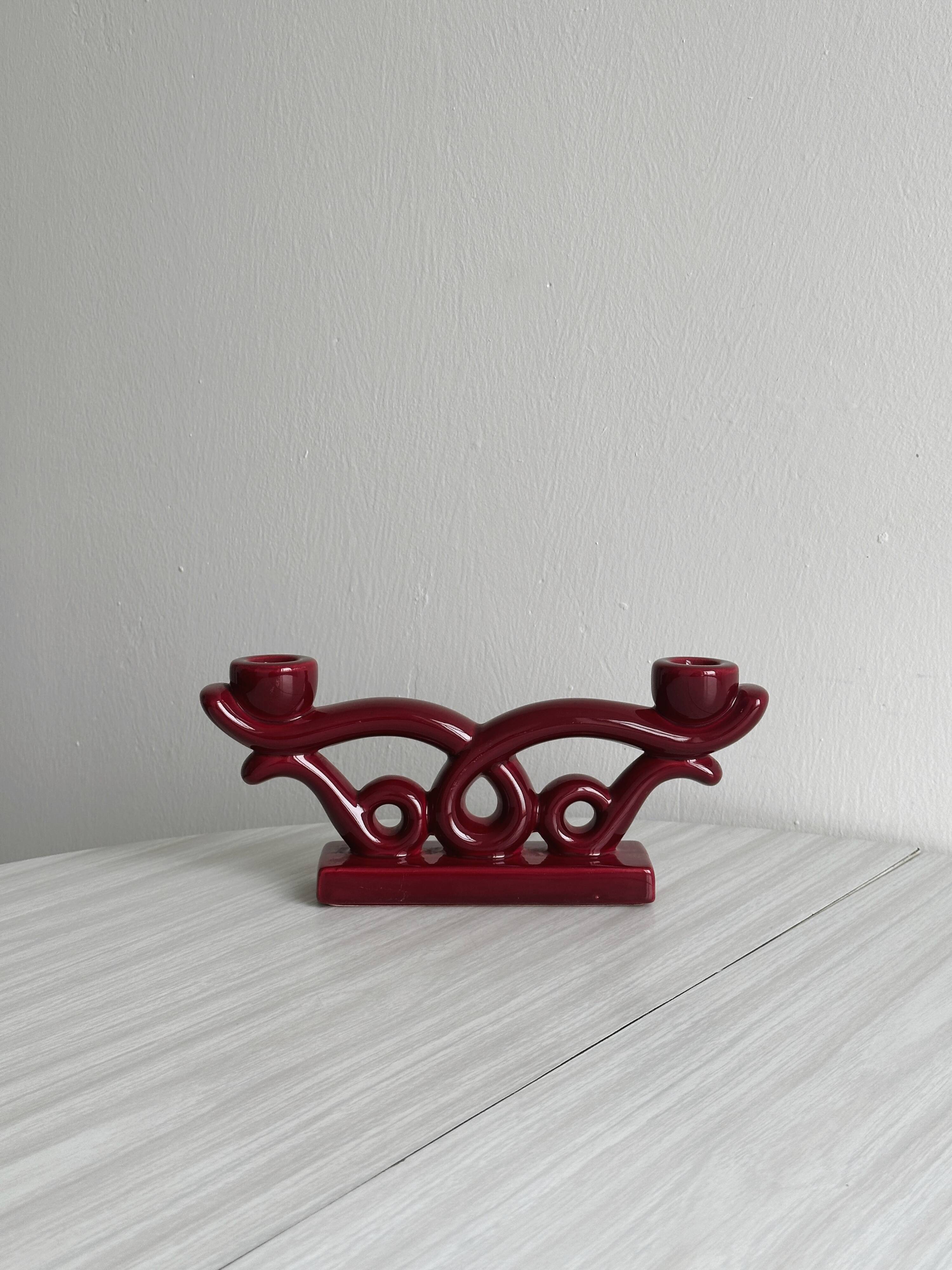Vintage burgundy red ceramic candlestick