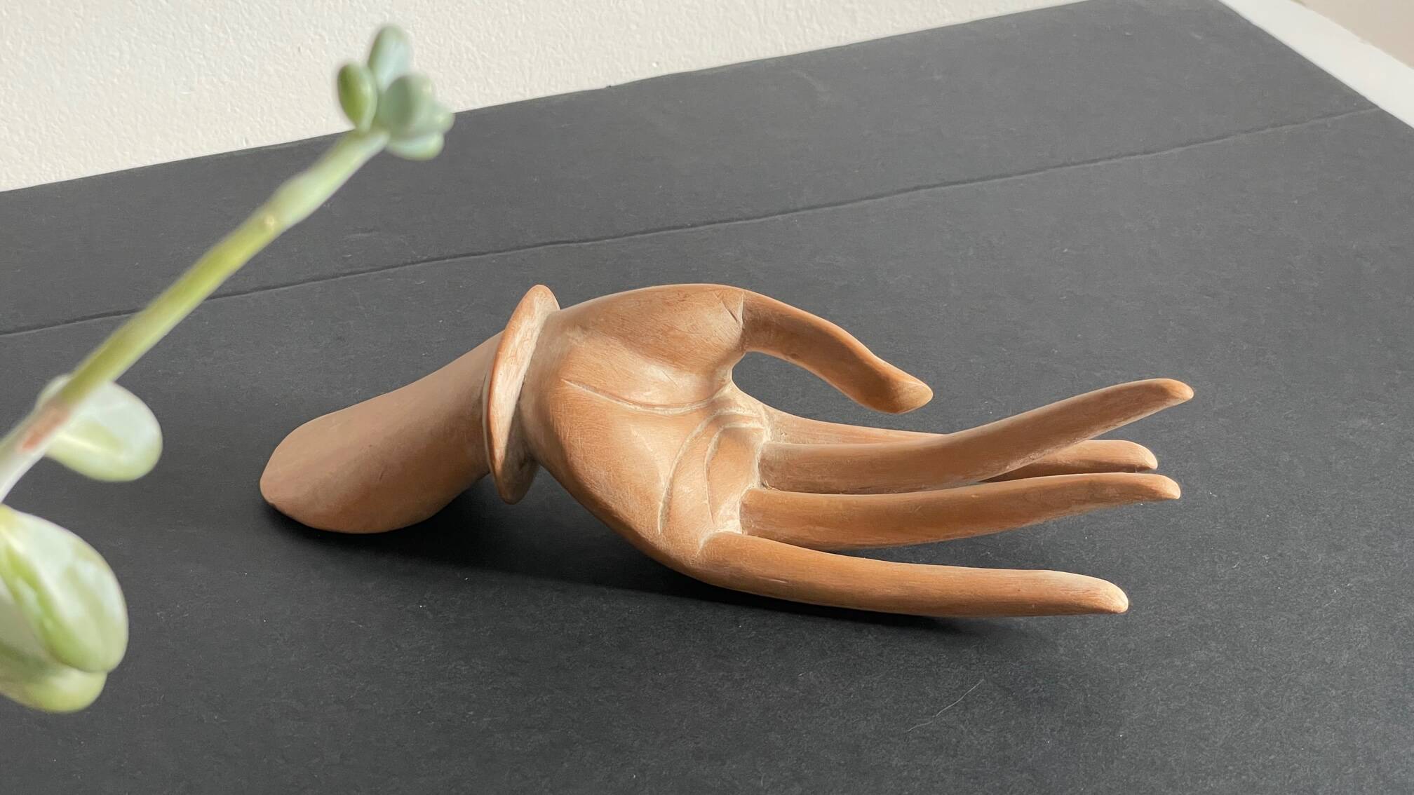 Wooden hand sculpture