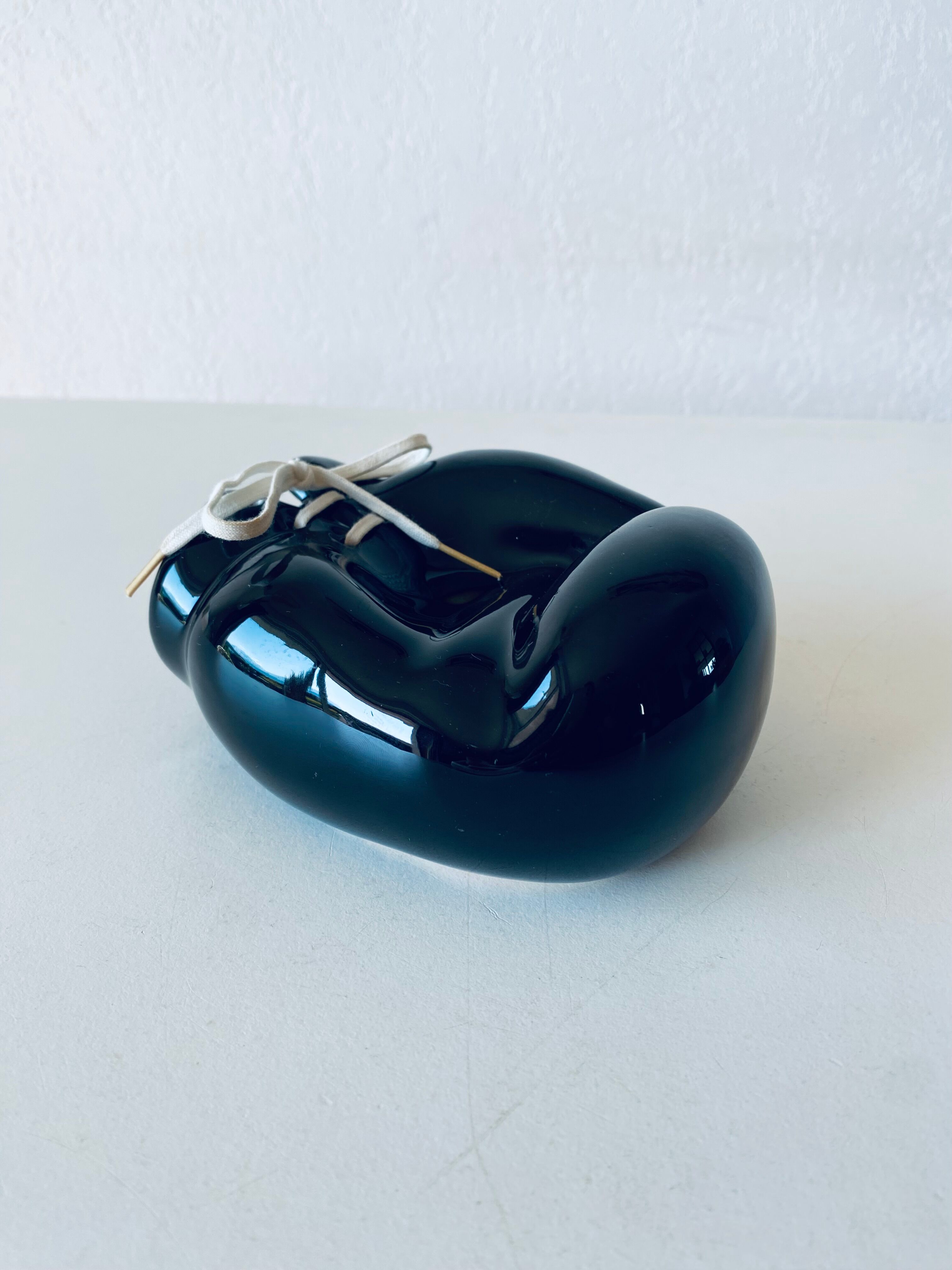 Empty pocket ceramic boxing glove