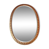 Golden mirror decorated with water leaves and palmettes