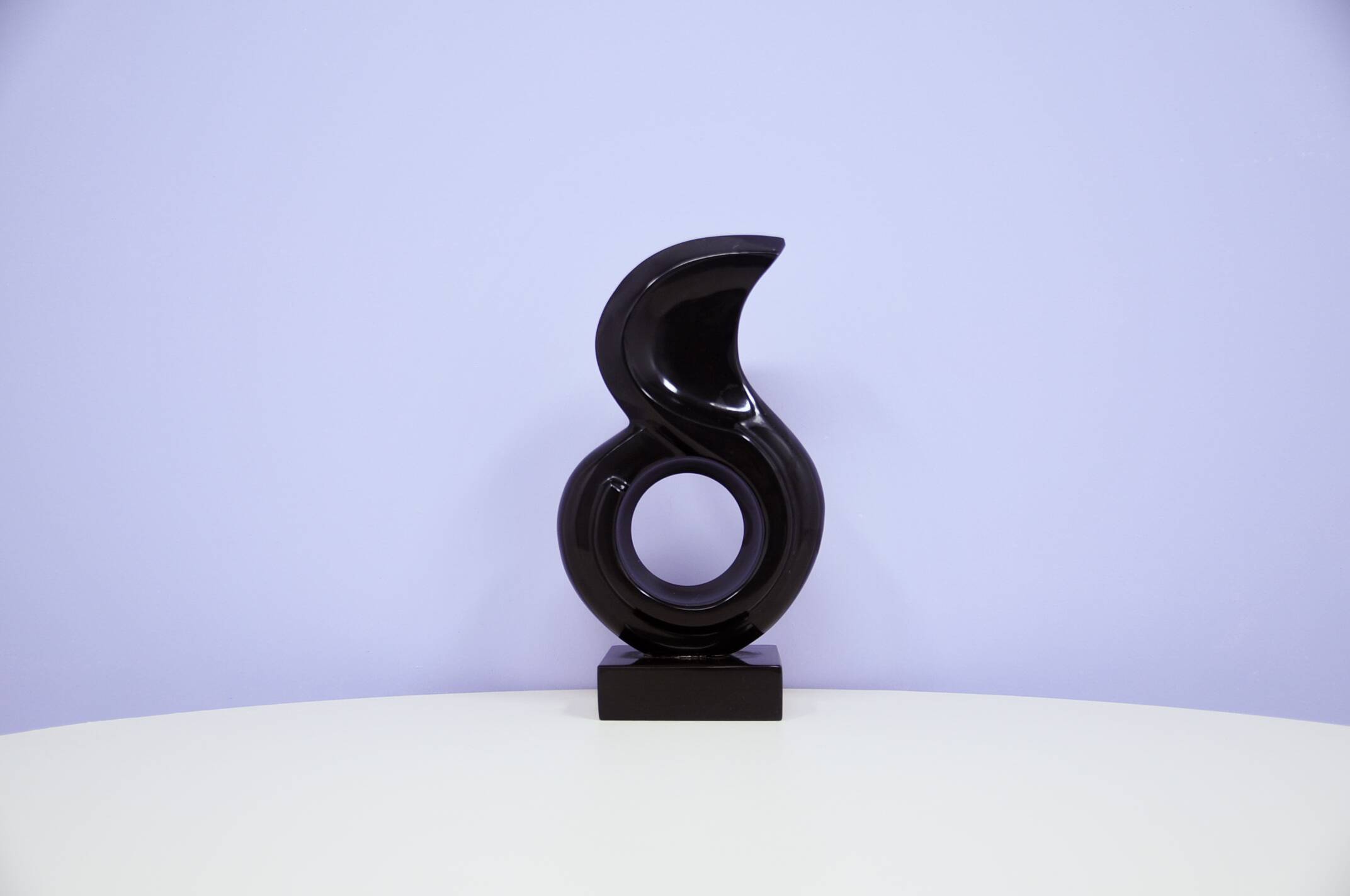 vintage black granite statue by Leonardo Nierman