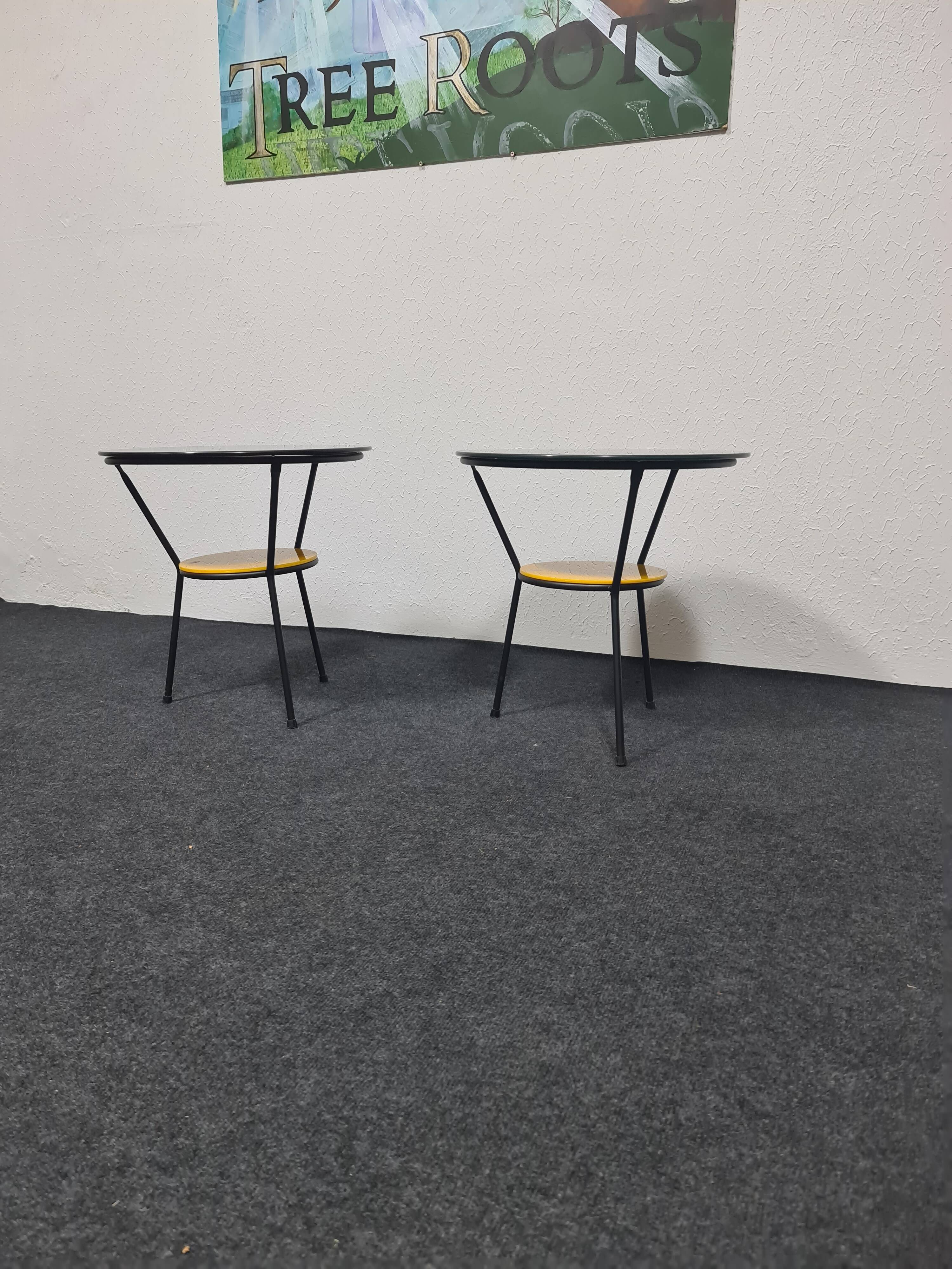 Pair of vintage glass topped side tables