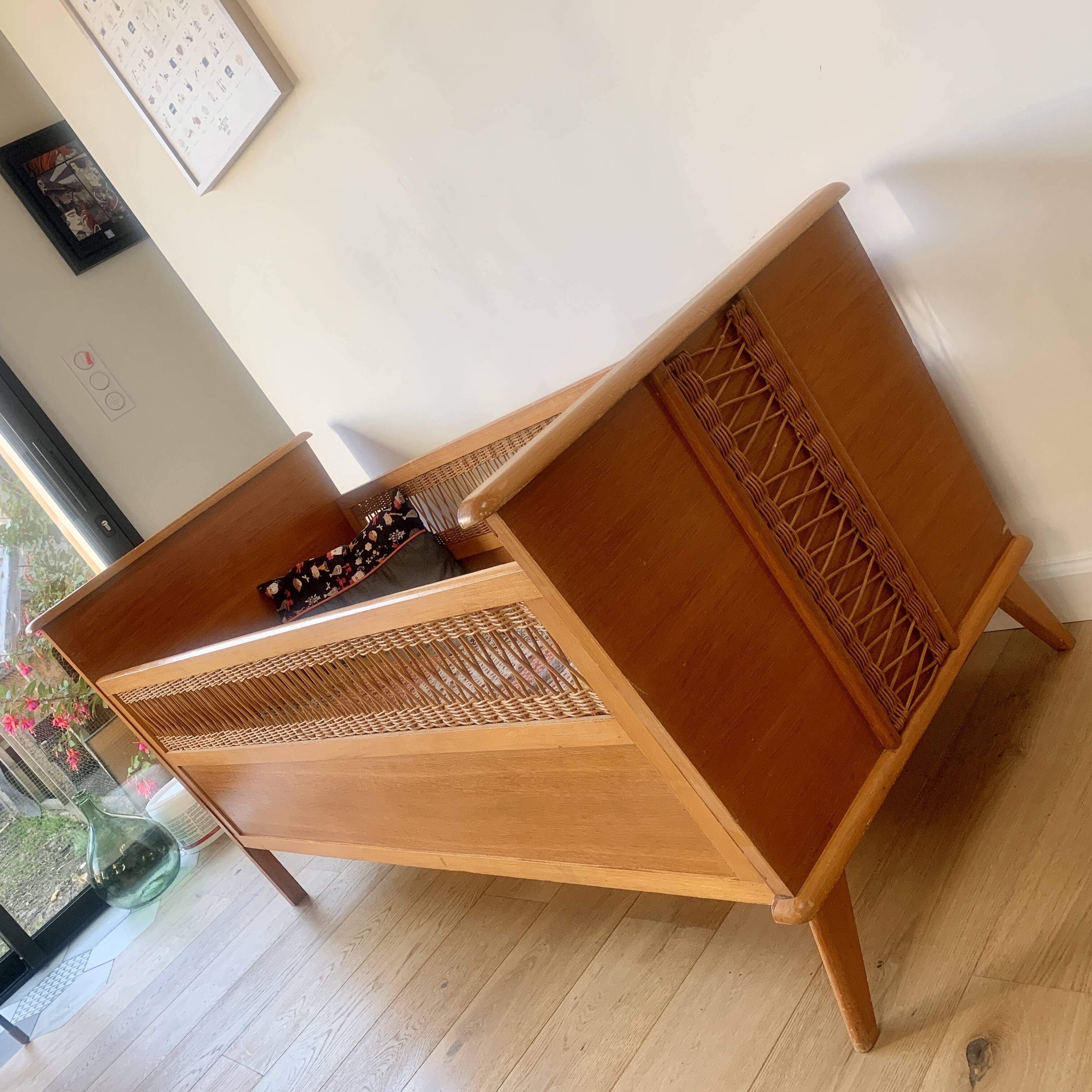 Wooden and wicker baby bed