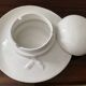 Vintage enameled porcelain hat pocket emptier