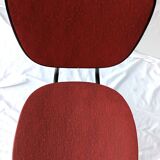 sixties chair with steel tube legs and a skaï seat