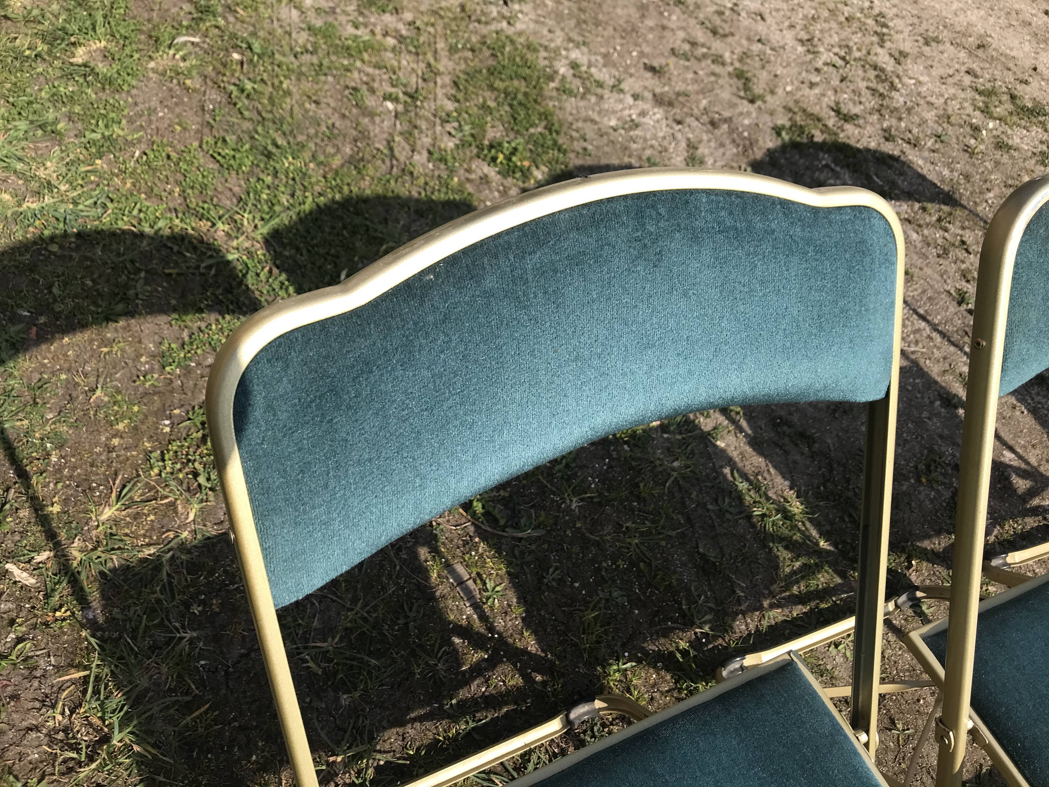 4 blue velvet folding chairs