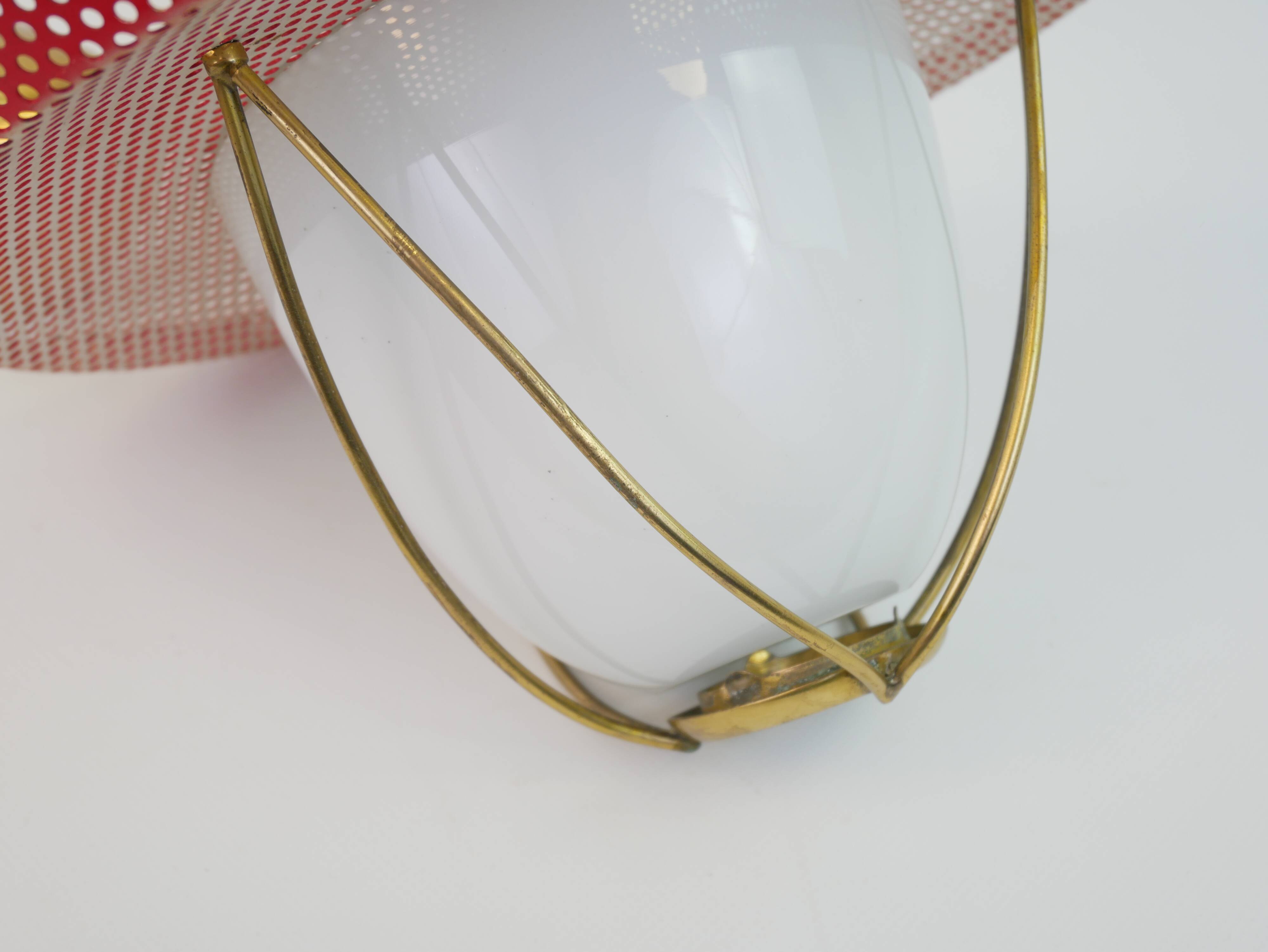 Suspension in perforated red lacquered metal, brass and opaline in the style of Mathieu Matégot
