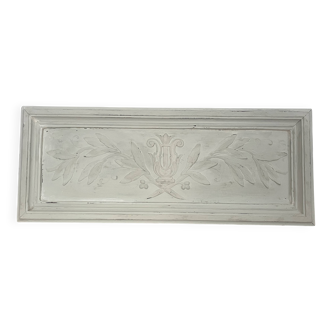 Carved wooden panel