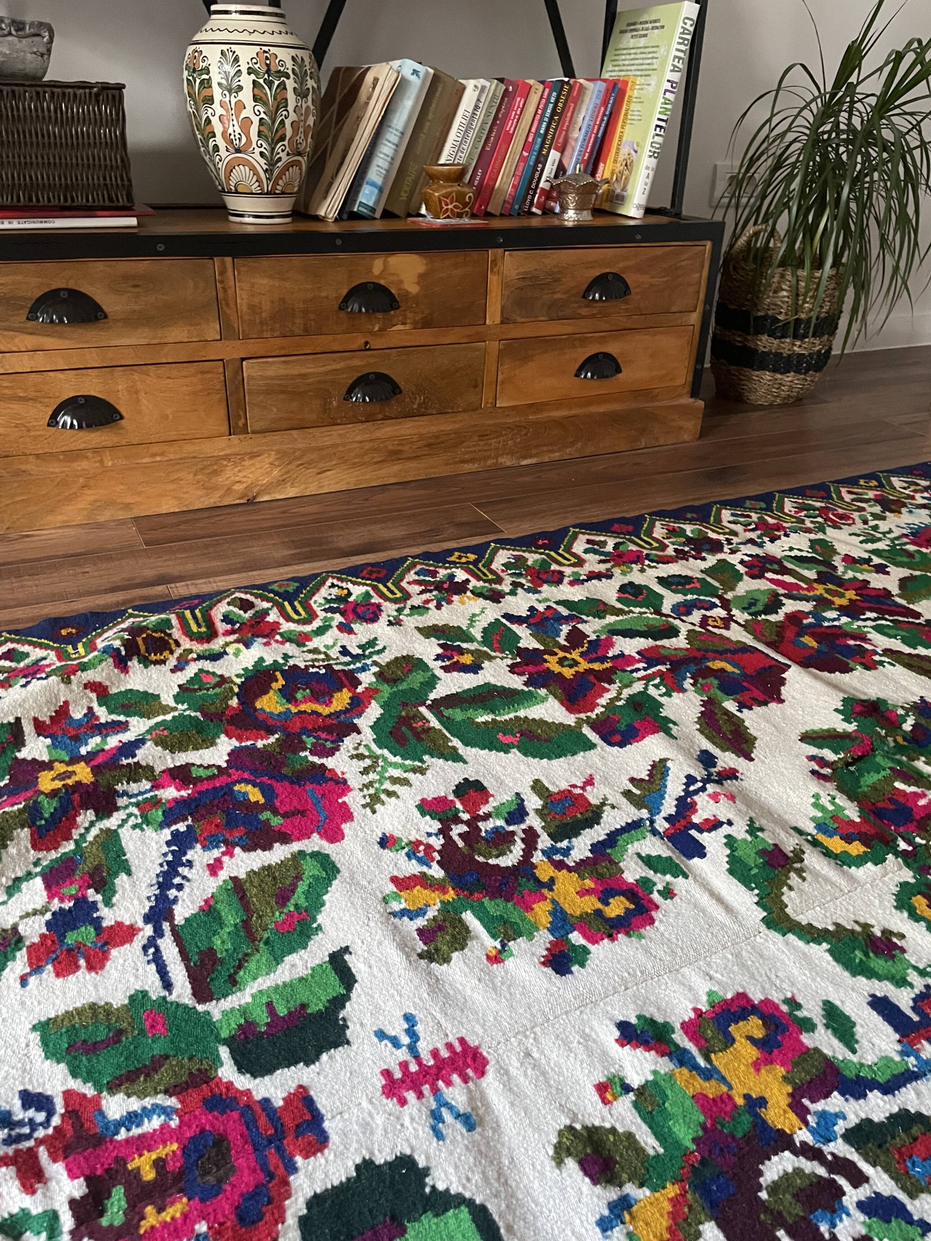 White vintage floral rug made by hand in Romania, beautiful flowers