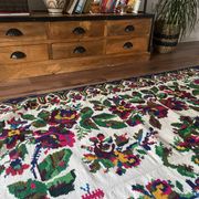 White vintage floral rug made by hand in Romania, beautiful flowers