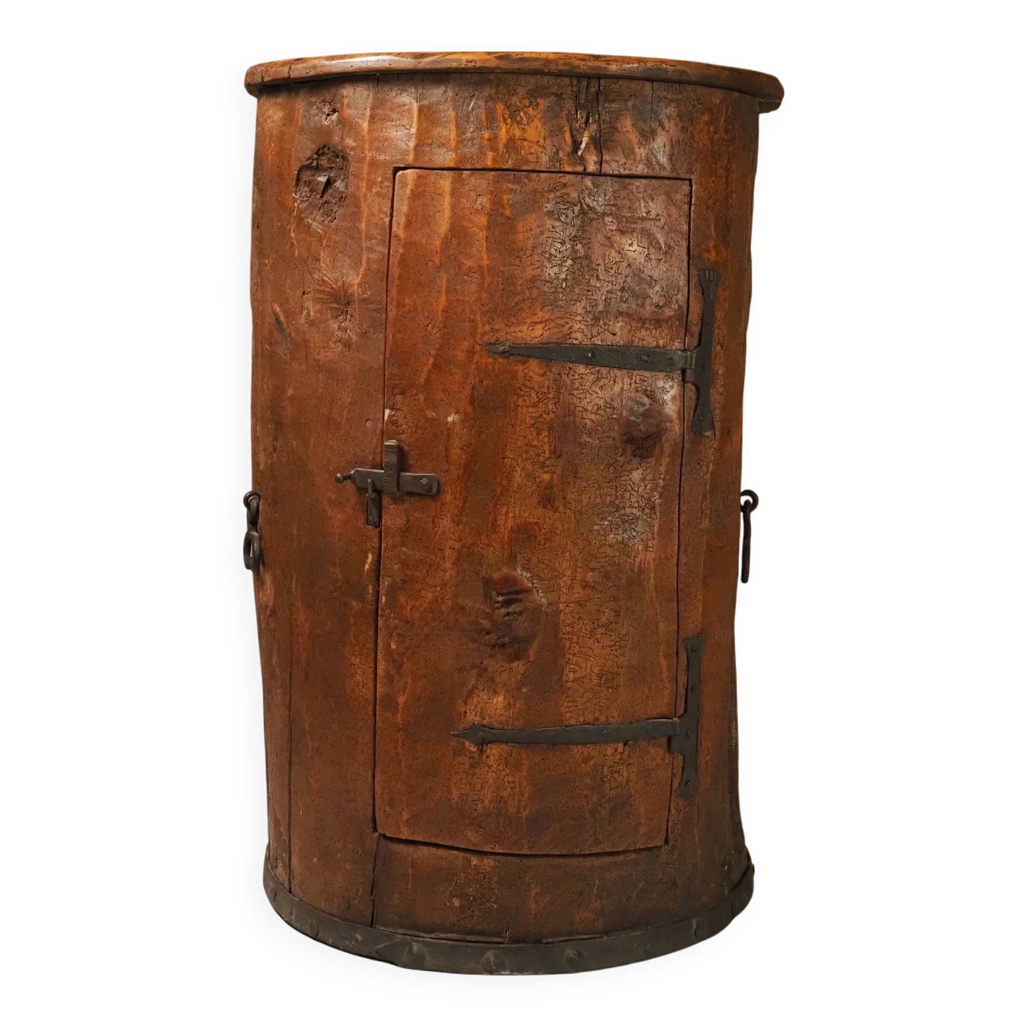 Primitive folk art cabinet made of an old tree trunk.