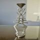 Ethnic “skeleton” candle holder in nickel-plated brass from the 80s