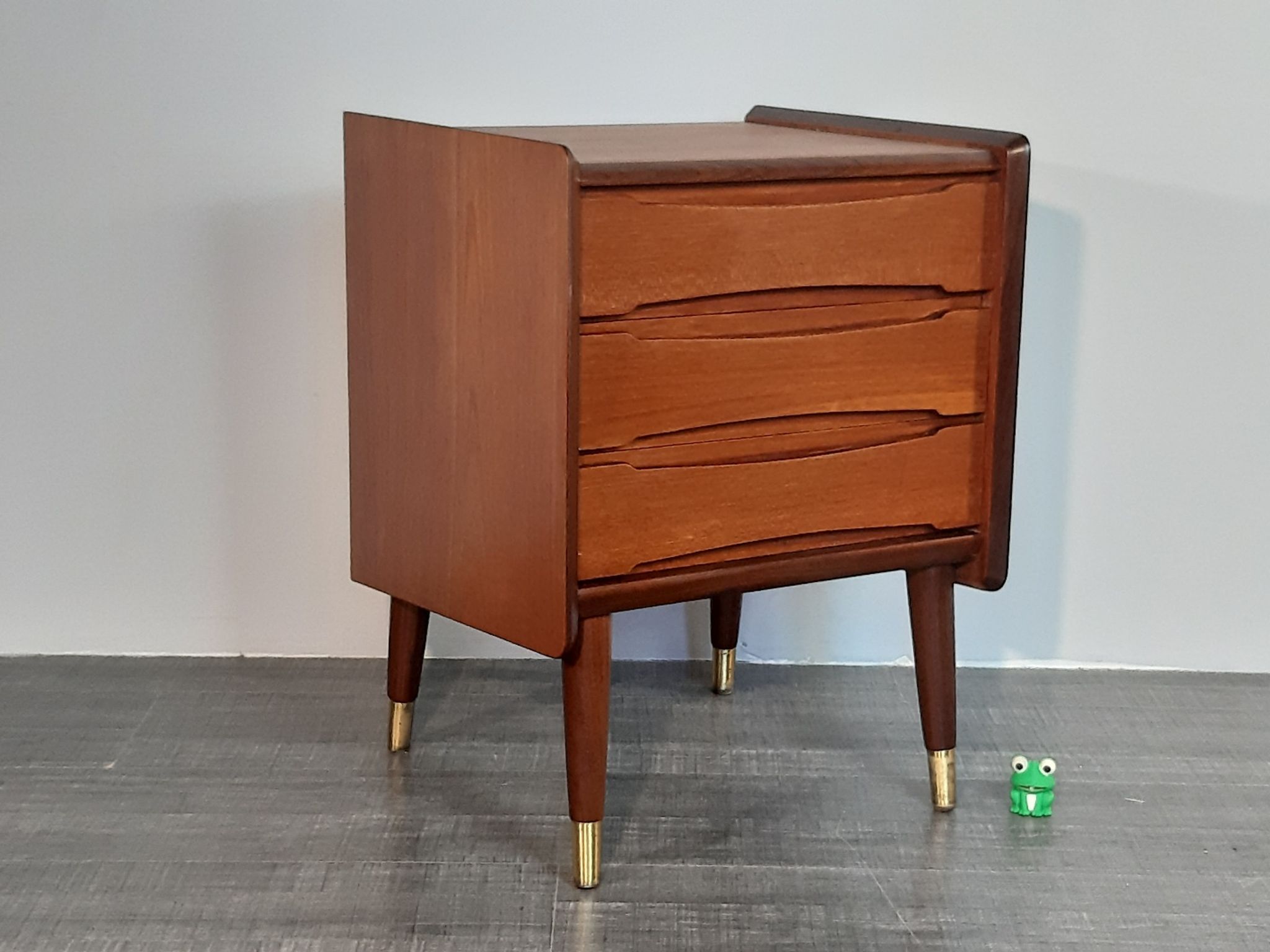 Norwegian bedside table with 3 drawers, teak and brass clogs
