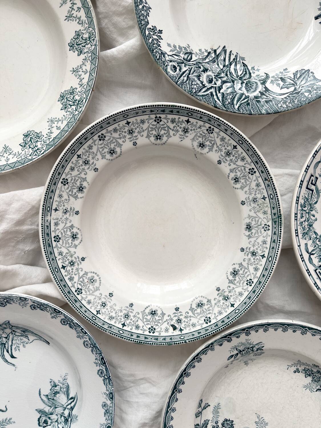 6 mismatched Saint Amand ironstone soup plates