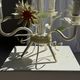 Small vintage cream metal flower chandelier with orange flowers and 3 arms.