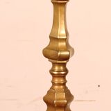 bronze candlestick from the 18th century converted into a lamp with its shade