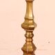 bronze candlestick from the 18th century converted into a lamp with its shade