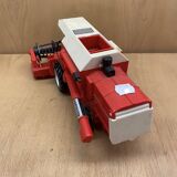 Red combine harvester