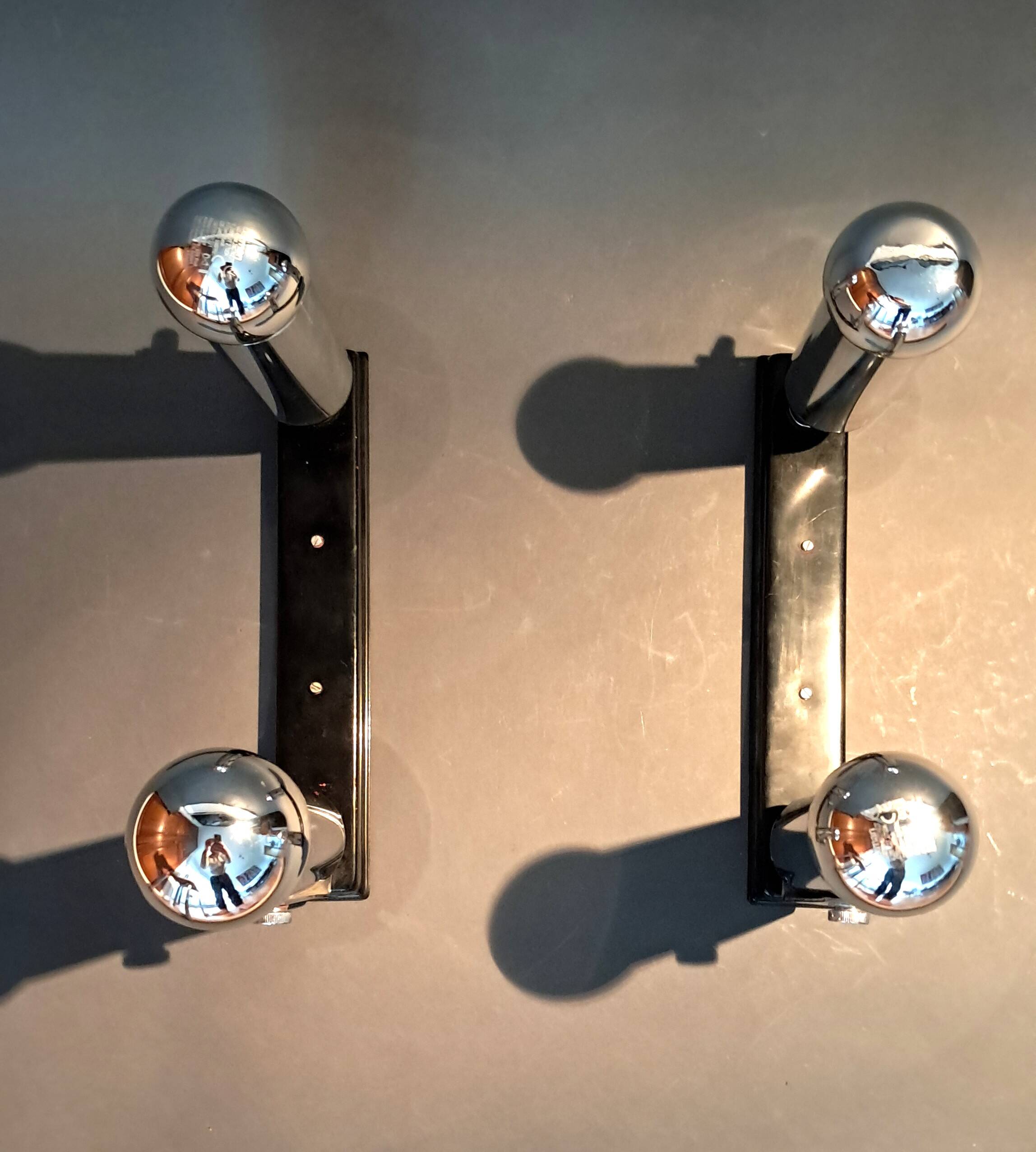 Pair of modernist chrome wall lights 1960.