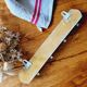 Old coat hook tea towel holder