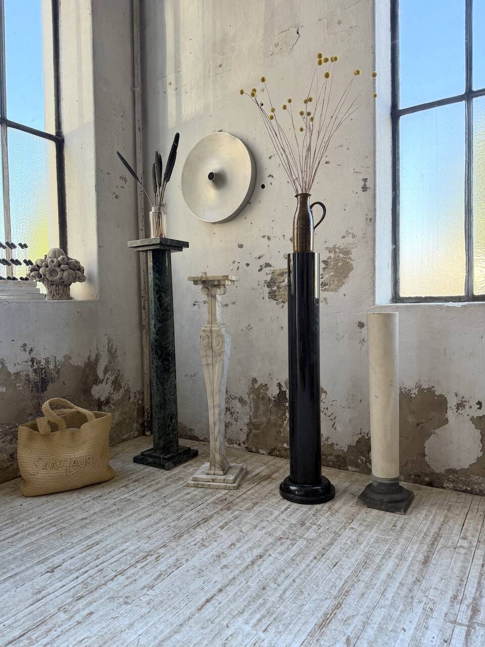 Set of 4 marble columns or pedestals.