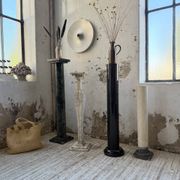 Set of 4 marble columns or pedestals.