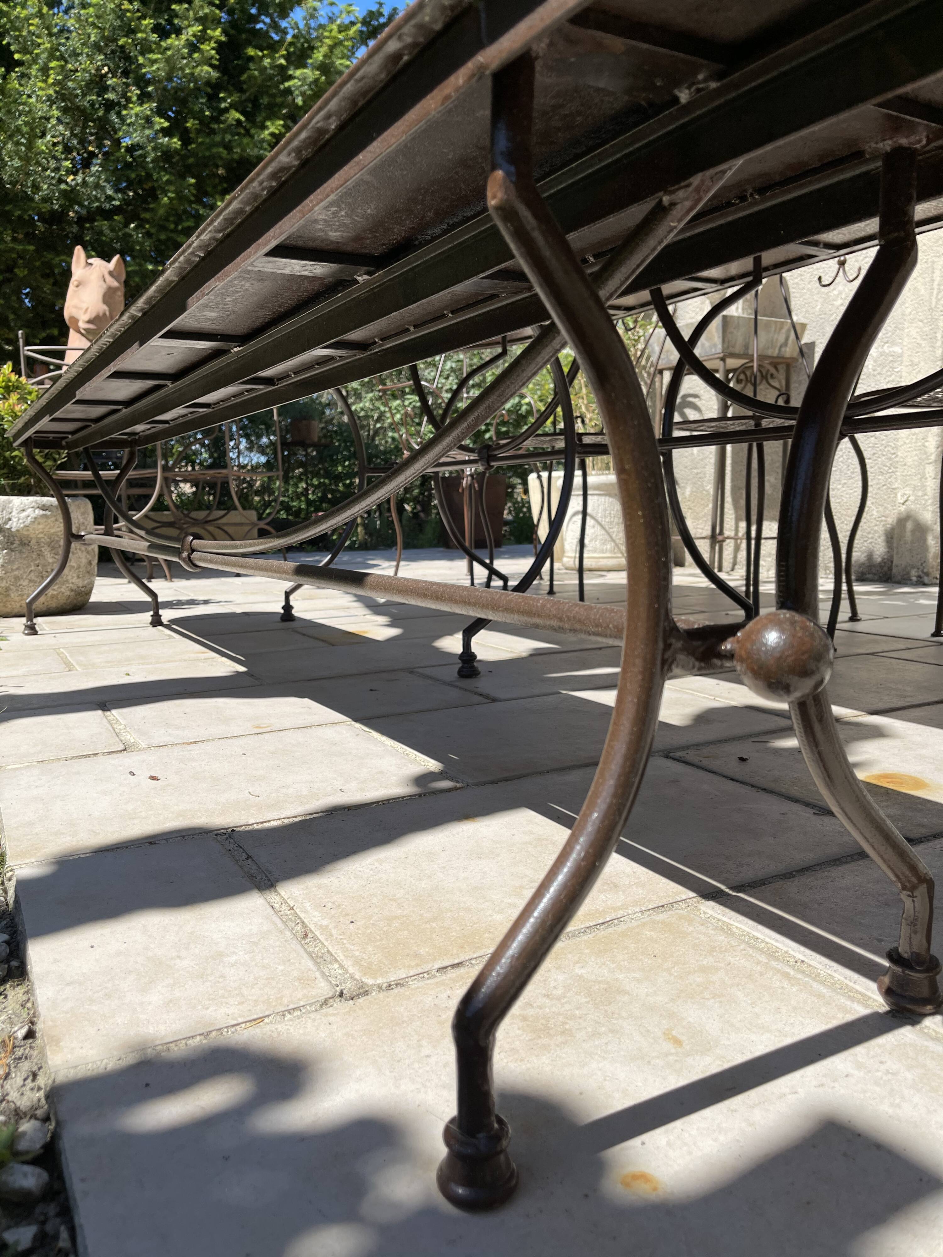 Artisanal wrought iron garden bench